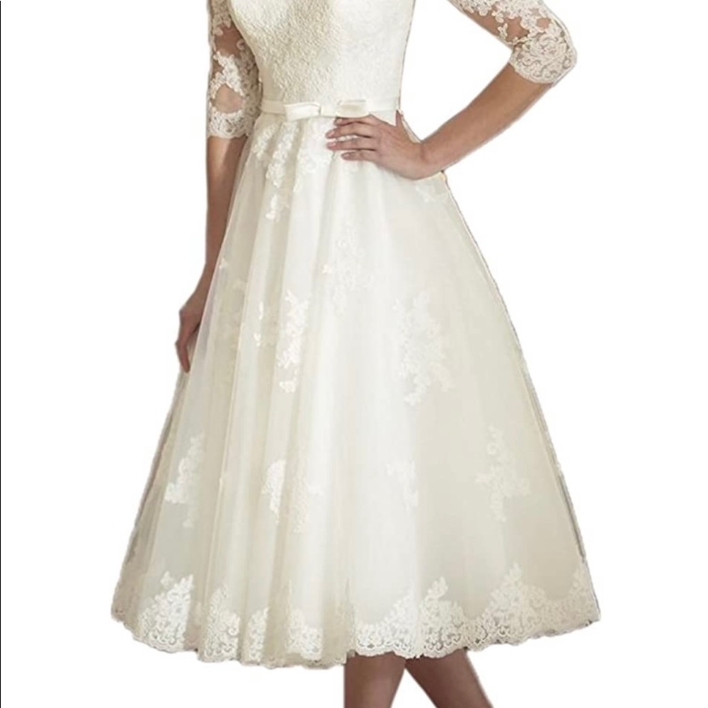 Wedding, confirmation, special occasion dress, ivory women’s size 10 (fits 6/8)